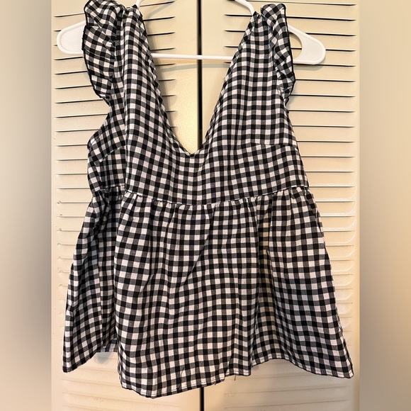 Runs large - Picture 1 of 2